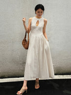 White Sleeveless Maxi Dress with Mock Neck and Cut-Out Detail