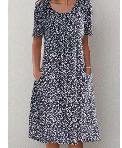 Women's Abstract Print Knit Mini Dress with Round Neck and Empire Waist