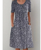 Women's Abstract Print Knit Mini Dress with Round Neck and Empire Waist