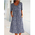Women's Abstract Print Knit Mini Dress with Round Neck and Empire Waist