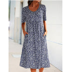 Women's Abstract Print Knit Mini Dress with Round Neck and Empire Waist