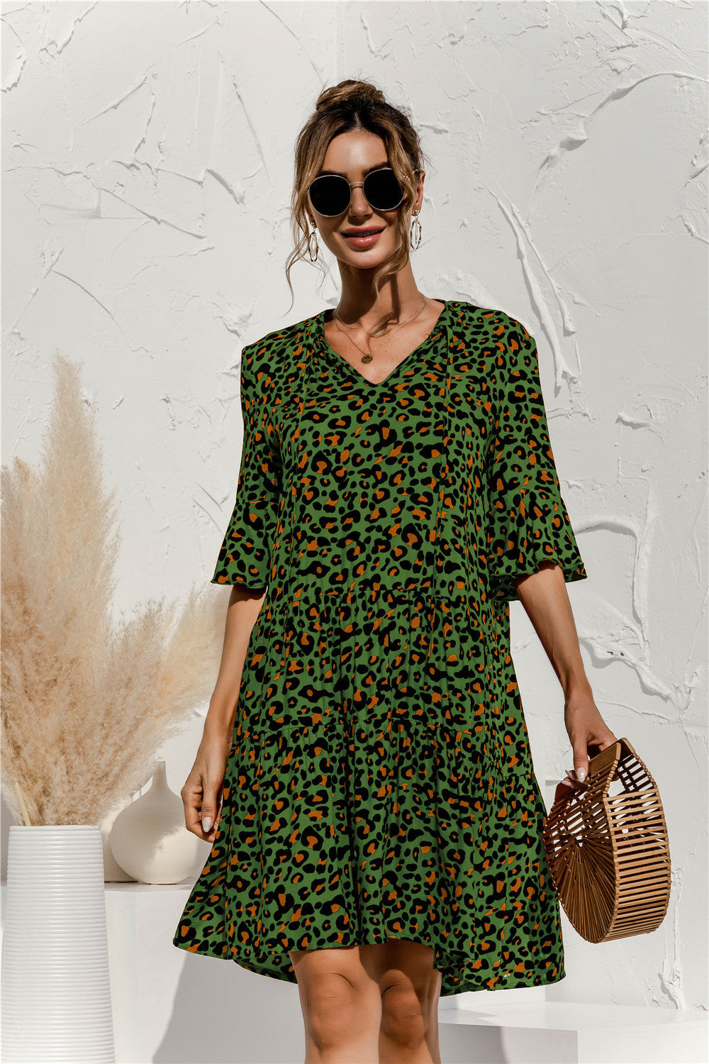 Women's Flowing Midi Dress with Leopard Print V-Neck
