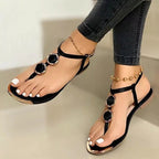 Women's T-Strap Flat Sandals with Gold Accents
